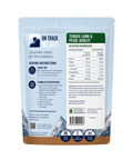 A stand-up pouch of Tender Lamb & Pearl Barley, On Track Meals for the outdoors, shown from the back with product details, heating instructions, and nutrition information visible on a white background.